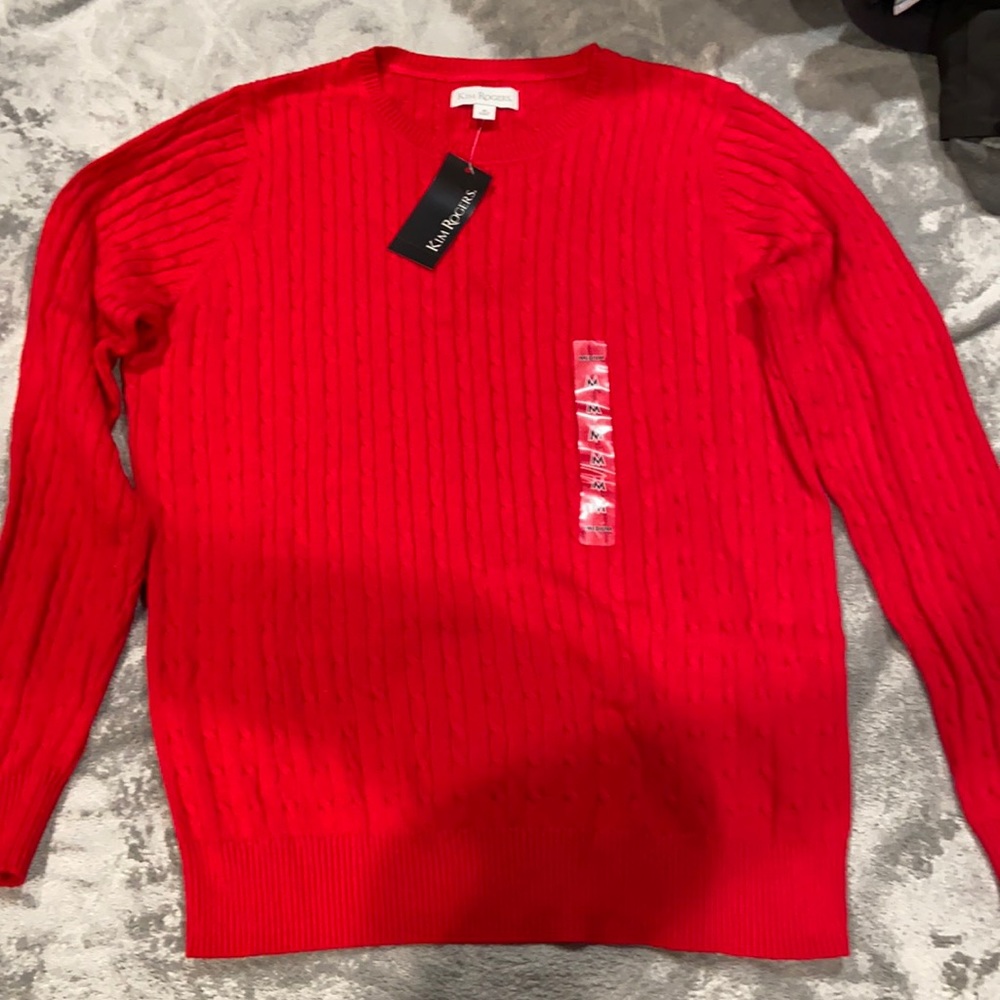 Kim Rogers red sweater